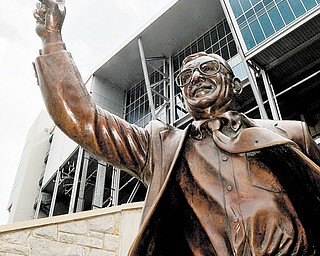 A statue of former Penn State head football coach Joe Paterno stands on the school’s campus. The statue was removed on Sunday, eliminating a key piece of the iconography surrounding the once-sainted football coach.