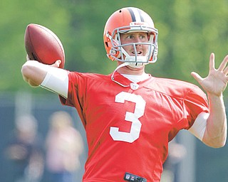 Browns quarterback Brandon Weeden, shown here during a rookie camp practice in May, signed a four-year, $8.1 million contract on Tuesday. He is expected to win the starting job this summer.