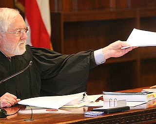 Judge William H. Wolff Jr., a visiting judge of Mahoning County Common Pleas Court, was ordered today to unseal key documents in the Oakhill Renaissance Place corruption case, which was dismissed a year ago.
The Ohio Supreme Court ruled unanimously in favor of The Vindicator and 21 WFMJ-TV, which filed the complaint with the top court seeking to have the documents made public.