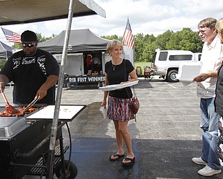 (L-R) Steve Jackson, Sherry Grant, Ken McCann, and Betty McCann at the Mastropietro Winery in Berlin Center, Ohio for the fourth annual ribs festival. 