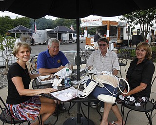 (L-R) Sherry Grant, Bob Timmerman, Ken McCann and Betty McCann enjoy the fourth annual ribs festival at the Mastropietro Winery.