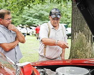 (L-R) Joe Mistak and Frederick Ross talk about Ross' 1926 Corvette at the car show in Woodland Park.