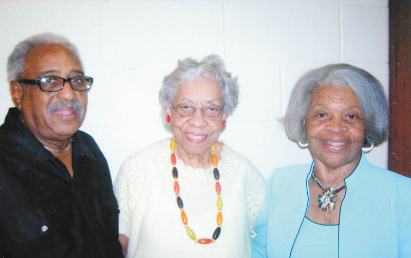 Promoting the Northeast Homeowners and Concerned Citizens Association’s fundraiser and recognition banquet set for Aug. 24 are, from left, Bennie Harrell; Olla Tate, publicity chairwoman; and Betty Crafter Royal, fundraiser chairwoman.