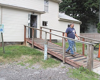 Raver walks down the handicap ramp, which also will be updated. The post has about 105 members.