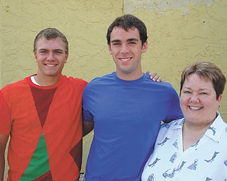 Canfield teens Adam Bouch, left, and Will Yobi, center, recently helped raise $375 at a flag football tournament and then donated it to Northeastern Ohio Adoption Services. Cindy Deal, right, NOAS executive director, said the organization appreciates their dedication and creativity in helping other teens who urgently need permanent families to count on. Northeast Ohio Adoption Services maintains offices in Warren and Chagrin Falls. The private nonprofit agency was founded in 1978 and has developed loving permanent families for more than 1,200 children.