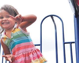 Clara Setting, 2, plays at Waddell Park in Niles, Ohio on July 27, 2012.