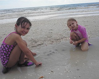 Marissa and Camryn play on the beach. Photo sent in by Rich T.