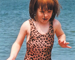 Sue Devon sent in this picture she took of her then-3-year-old daughter Emily playing at a Lake Erie beach.