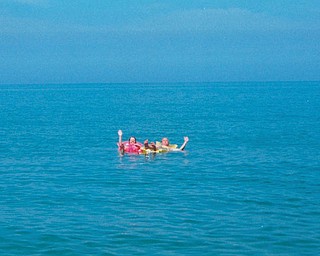 Sam Zapka and his sister Pam Raseta are all afloat on the waters of Lake Erie in Conneaut, Ohio.