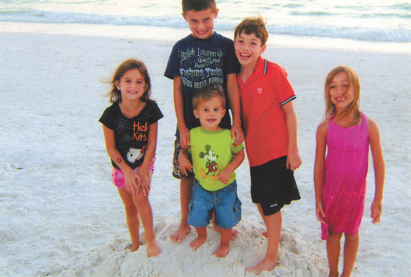Evan and Madison Macko and Paulie, Anna and William Laczo, all grandchildren of Paul and Vicki Laczo of Poland, enjoy some time together at Siesta Keys, Fla., in 2010. Photo sent in by Vicki Laczo.