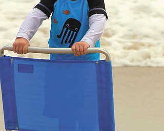 Sam Manning, 2, has a giggle at Bethany Beach in July. Photo sent in by Joyce Buzzacco.