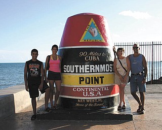 A trip to Key West isn't complete without visiting the southern-most U.S. point. Here are Dominic and Lisa Pannunzio, along with Andrea and Anthony.