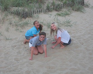 Delia Walkowiec of Boardman spends time with Julie and Katelyn Matijasic of Hagerhill, Ky., while on vacation in Virginia Beach. Photo sent in by Crystal Walkowiec.