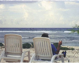 John Ploskodniak sent in this photo of his brother taken at Little Cayman Islands. John said his brother wanted a picture of two chairs by the ocean with the caption, "There is always a chair waiting for you."