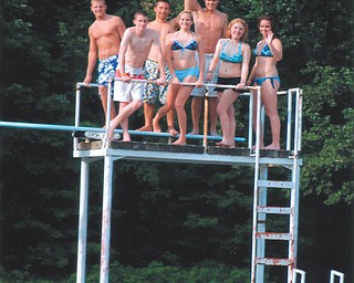 Partygoers enjoy Leanna Hartsough's swim party at Speece Lake in Berlin Center. Photo by Lana VanAuker of Canfield.