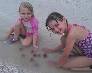 Sisters Camryn and Marissa find live crabs on Lovers Key Beach in Florida. Photo sent in by Kelly Alexander.