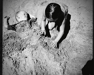 Jamie Williams of Austintown sent this photo of her son Sawyer and daughter Addison playing in the sand at Huntington Beach in Cleveland.