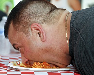 Dean Parry participates in a pasta eating contest at the Greater Youngstown Italian Festival on August 4, 2012. Dean won second place, just behind Duke Girardi, who took first place.