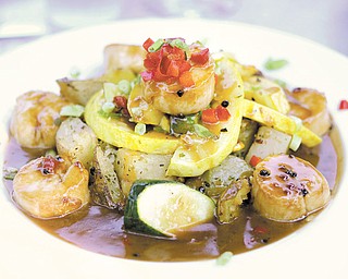 Bourbon Scallops served with roasted potatoes and a vegetable medley in a Jim Beam bourbon sauce at L'uva Bella Winery.