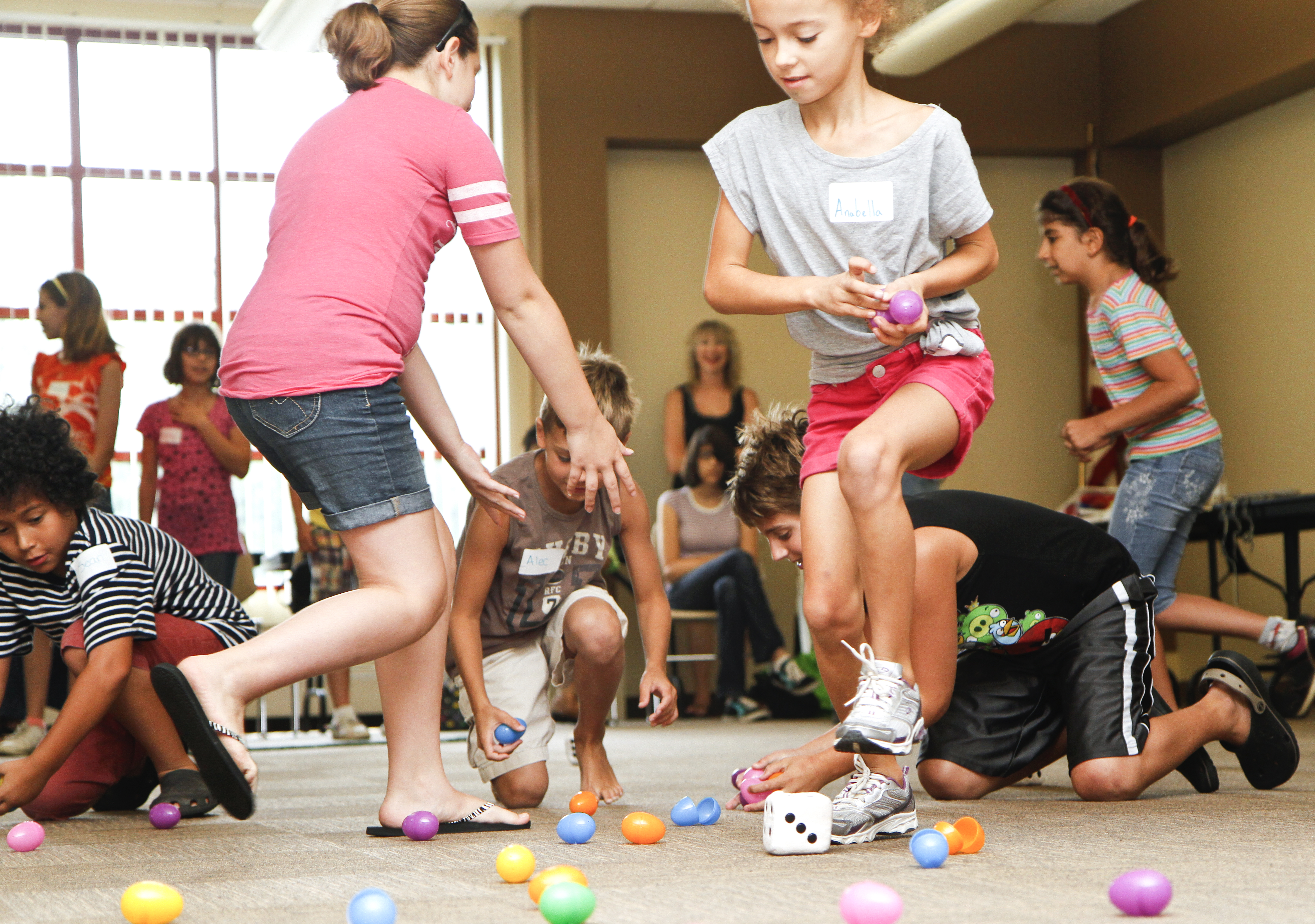 Anabella Soanes-Carter, 9, of Boardman, Ohio collects eggs during the 'Live Pacman' game at the Boardman Library on August 9, 2012. 