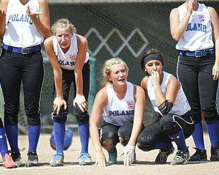 (L-R)Kat Wilson, Cara Kalduris and Jenna Schettler react to the loss of the game.