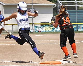 Cara Kaldouris runs to base after making a hit.