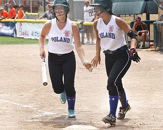 Alley Deemer (L) congratulates Jenna Schettler (R) on her score.