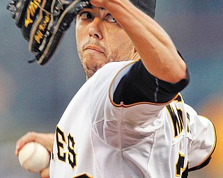 Pittsburgh Pirates starting pitcher Jeff Karstens throws against the Los Angeles Dodgers in the first inning
of a game Monday in Pittsburgh.
