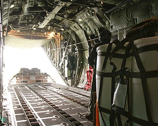 ROBERT K. YOSAY | THE VINDICATOR..payloadexits the back of the C130 H to a location in the Ravenna Arsenal - .-30-