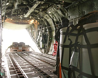 ROBERT K. YOSAY | THE VINDICATOR..payloadexits the back of the C130 H to a location in the Ravenna Arsenal - .-30-