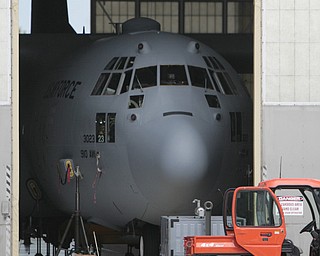 ROBERT K. YOSAY | THE VINDICATOR..Crews work on a C-130 H at the910th Vienna Air Base ..-30-