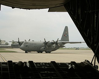ROBERT K. YOSAY | THE VINDICATOR.. a C130 H follows in formation is framed by the back of another palne - -30-