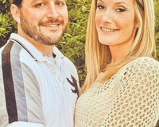 Jason Peretti and Danielle Ellenis