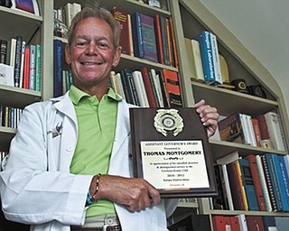 Dr. Thomas Montgomery, medical director of Integrative Medical Centers of Ohio, 148 W. Main. St., Cortland, recently received the 2012 Assistant Governor’s Award for his distinguished service to the Cortland Rotary Club. Montgomery has been an active member of the Rotary for 32 years and a community advocate for more than 30, most recently running for representative in the 65th district in the past election.