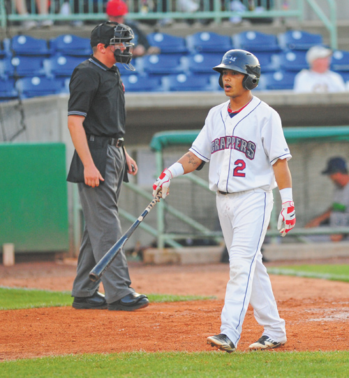 The Scrappers’ Aaron Siliga walks off the field after striking out on his second at-bat during Monday’s baseball game against the Jamestown Jammers at Eastwood Field in Niles. Mahoning Valley managed only four hits in the 8-4 loss.