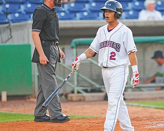 The Scrappers’ Aaron Siliga walks off the field after striking out on his second at-bat during Monday’s baseball game against the Jamestown Jammers at Eastwood Field in Niles. Mahoning Valley managed only four hits in the 8-4 loss.
