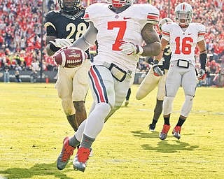 With the days dwindling until the start of Ohio State’s first game under Urban Meyer, the 18th-ranked Buckeyes don’t really have a go-to guy at running back, considering Jordan Hall (7), heir apparent to Warren Harding’s Dan Herron, is still recovering from a cut tendon in his foot.