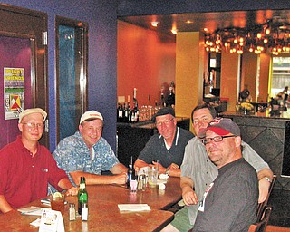 The Burger Guyz, along with Viking Jim (in the Indians cap), take in the eclectic atmosphere at the Lemon Grove’s new location.
