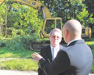 The house at 1018 High St. in Youngstown was torn down Wednesday during a news conference with city and Mahoning County officials and Ohio Attorney General Mike DeWine, facing front. Mahoning County received $1.5 million through the AG’s Moving Ohio Forward Grant Program. Of that, $1 million is going to the city.