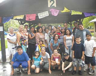 The Hispanic community in western Pennsylvania and eastern Ohio recently celebrated its 11th annual picnic at Pearson Park in New Castle. More than 60 people attended this reunion, which is organized every year by the Rev. Hope Cummins of Iglesia Latina
Emmanuel and Wayside Emmanuel Church; and Paulina Montaldo, a Spanish professor at Youngstown State University. People from Chile, Ecuador, Peru, Colombia, Dominican Republic, Cosa Rica, El Salvador and Mexico, along with Americans who like to practice their Spanish and learn about other cultures, attended the picnic. Paz Costello from the Crisis Shelter of New Castle and Meagan Niebler from Circulo de Amigas (Circle of Friends) of the YWCA of Pittsburgh gave information about services in Spanish available to the community in the area.