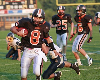 ROBERT  K.  YOSAY  | THE VINDICATOR --..Pushed out of bounds is McDonalds #36 P J Mansky  as Springfields #8  Hunter Snyder  picks up a first down and almost into the end zone - (set up a score for Springfield)  behind him is 25 Christian Feezle and #8  Hunter Snyder  - McDonald @ Springfield - Game was at New Springfield...(AP Photo/The Vindicator, Robert K. Yosay)