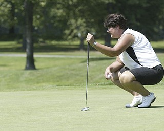 William D Lewis The Vindicator  Michele Caputo lines up a putt Friday at Mil Creek.
