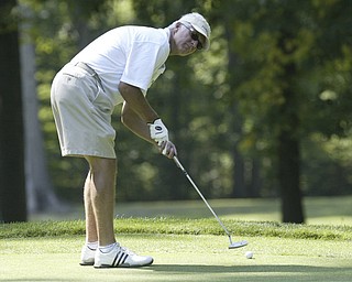 William D Lewis The Vindicator  Ray Duffett putts Friday at Mill Creek.