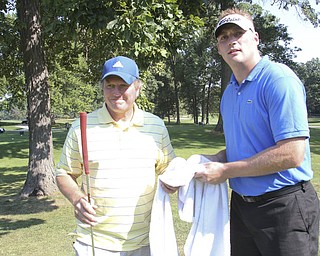 William d Lewis the vindicator Keith Schubert, right, and his father FrankSchubert who served as caddy  Friday at Mill Creek.