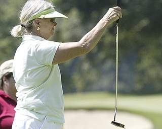 William D Lewis The Vindicator  Sally Taylor lines up a putt Friday at Mil Creek.