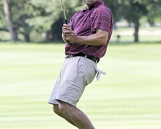 William D Lewis The Vindcator  AJ Myers watches his putt come up shortat Trumbull Saturday.