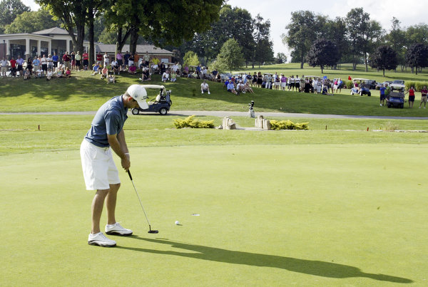 William D. Lewis The Vindicator  Anthony Conn winner of open division golf  puts on finalgreen at Lake Club Sunday.