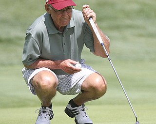 William D. Lewis The Vindicator Ed Antonelli, winner of super senior (CHECK TO MAKE SURE THAT IS RIGHT DIVISION) lines up a putt at Lake Club Sunday.