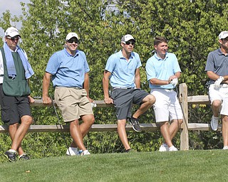 William D. Lewis The Vindicator Waiting to tee off at Lake Club Sunday. 2nd from left, Zack Mansky (his caddy) is at left, Conn's caddy, Jonah Karzmer and Anthony Conn.