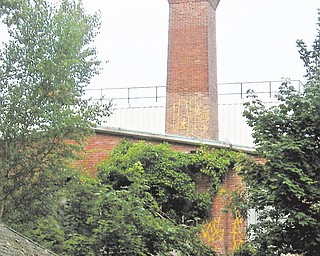 A brick tower rises above the Shoreham, N.Y., building that was once the laboratory of physicist/inventor
Nikola Tesla. In a little more than a week, donors from more than 100 countries have kicked in about $1 million
through a social-media website to pay for the restoration of the 110-year-old laboratory.